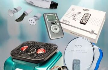 Tiens health care devices and boxed gift sets on a light studio background